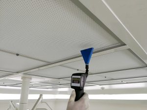 Air testing equipment checking ceiling area after asbestos removal